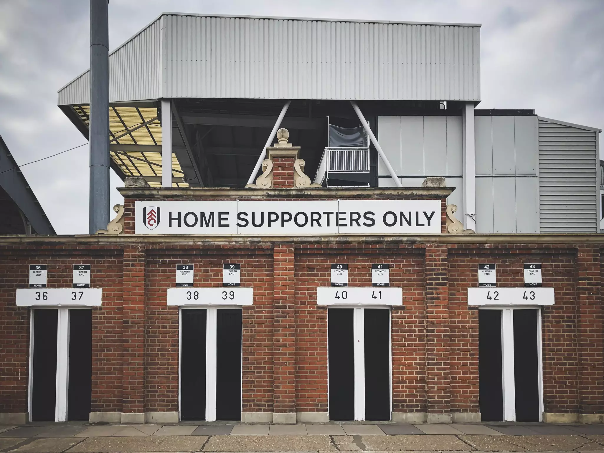 View of the entrance to Fulham's Craven Cottage stadium in London, England.