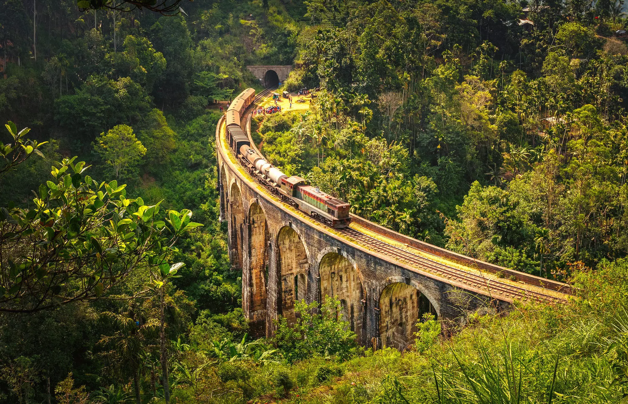 Sri Lanka's mountain railways slice through emerald hills. Milan Chudoba / 500px / Getty Images
