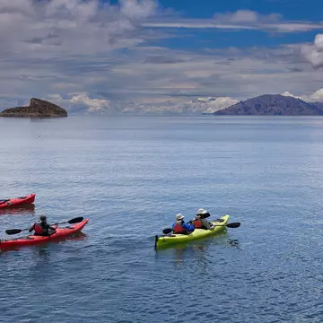 Sea kayaking on Lake Titicaca, Peru. BETO SANTILLAN/Shutterstock