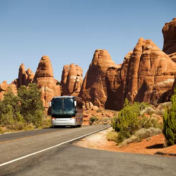 From driving desert highways to public transportation in the major cities, here's how to get around in Utah. Getty Images