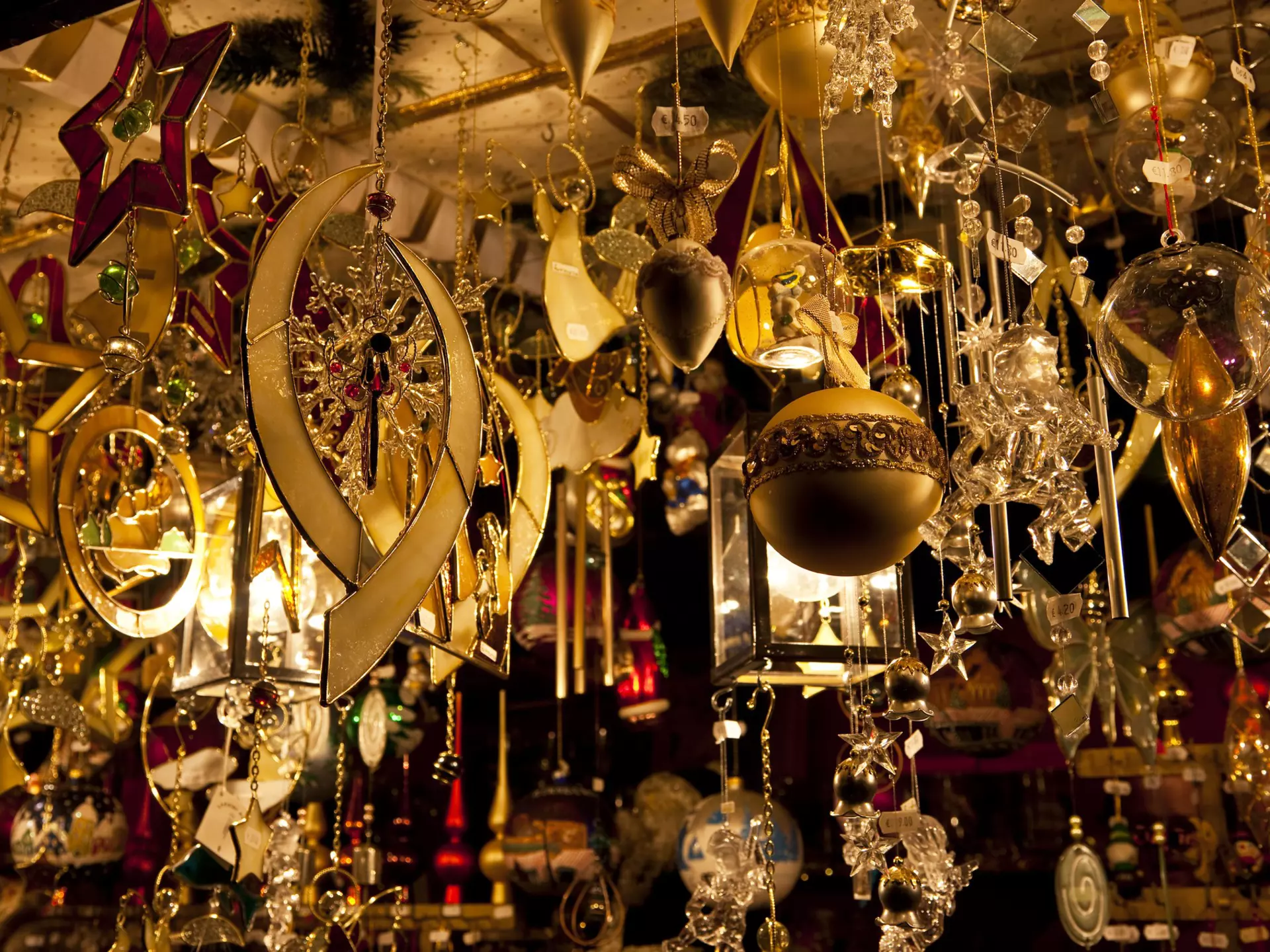 Golden glass and crystal Christmas ornaments on sale at Christmas market.