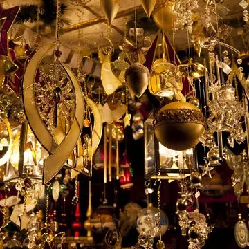 Golden glass and crystal Christmas ornaments on sale at Christmas market.