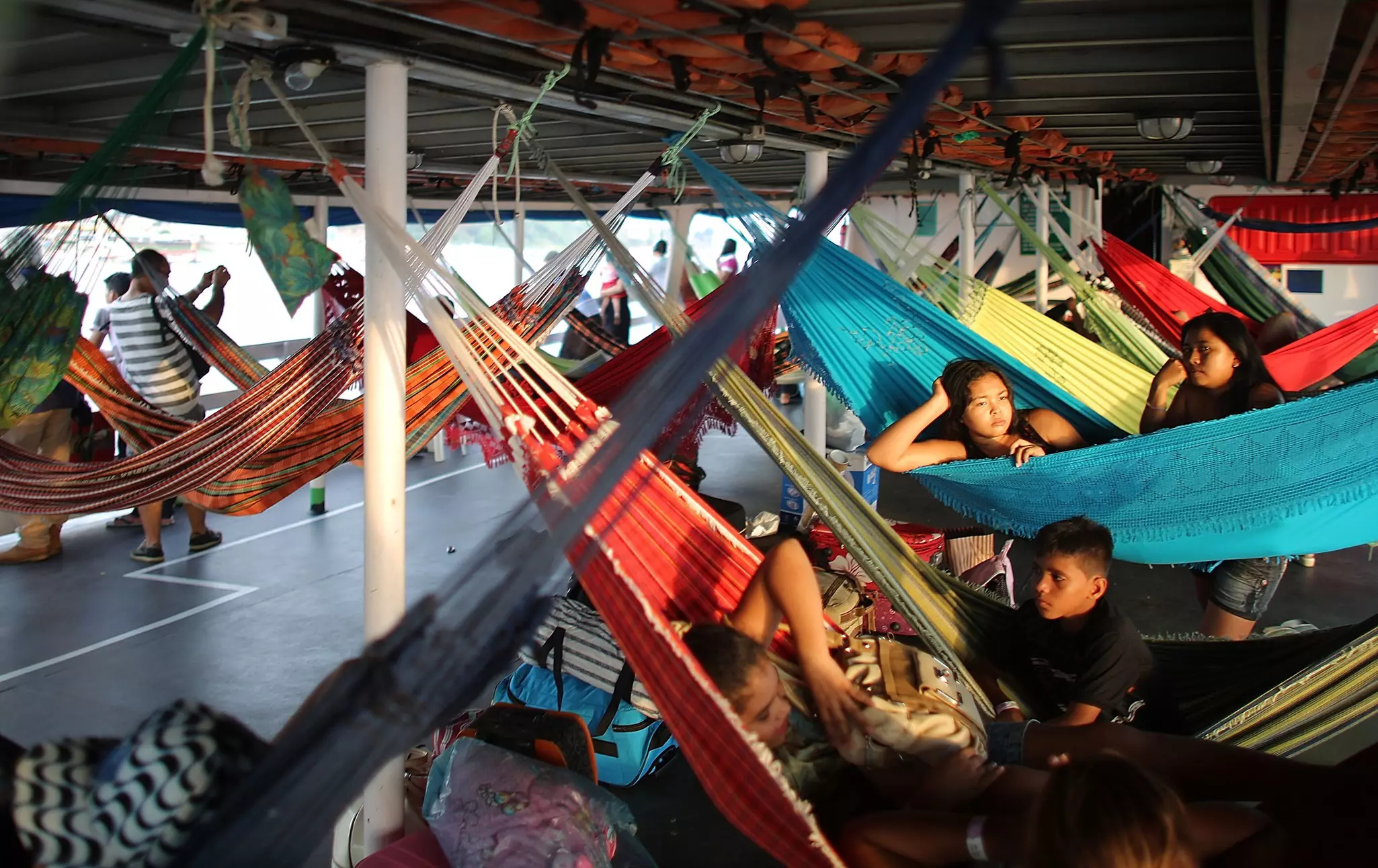 Bring your own hammock when you travel on one of the Amazon’s many ferry boats © Mario Tama / Getty Images