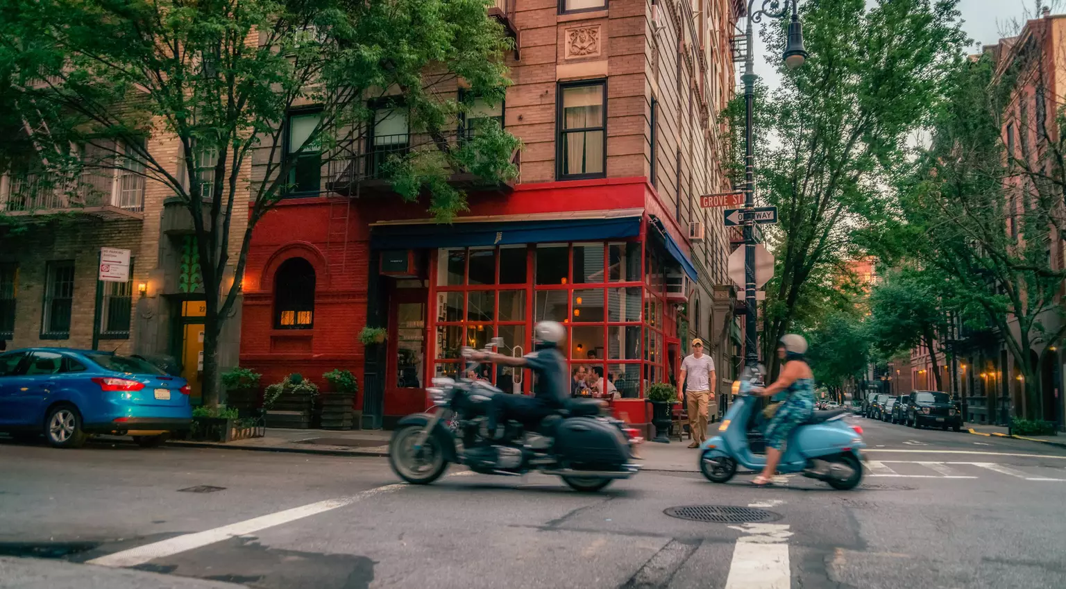 NEW YORK CITY - JULY 29, 2016: 'Friends' apartment location in New York City. Itâ??s located at 90 Bedford Street at the corner of Grove Street. Low light vivid image.