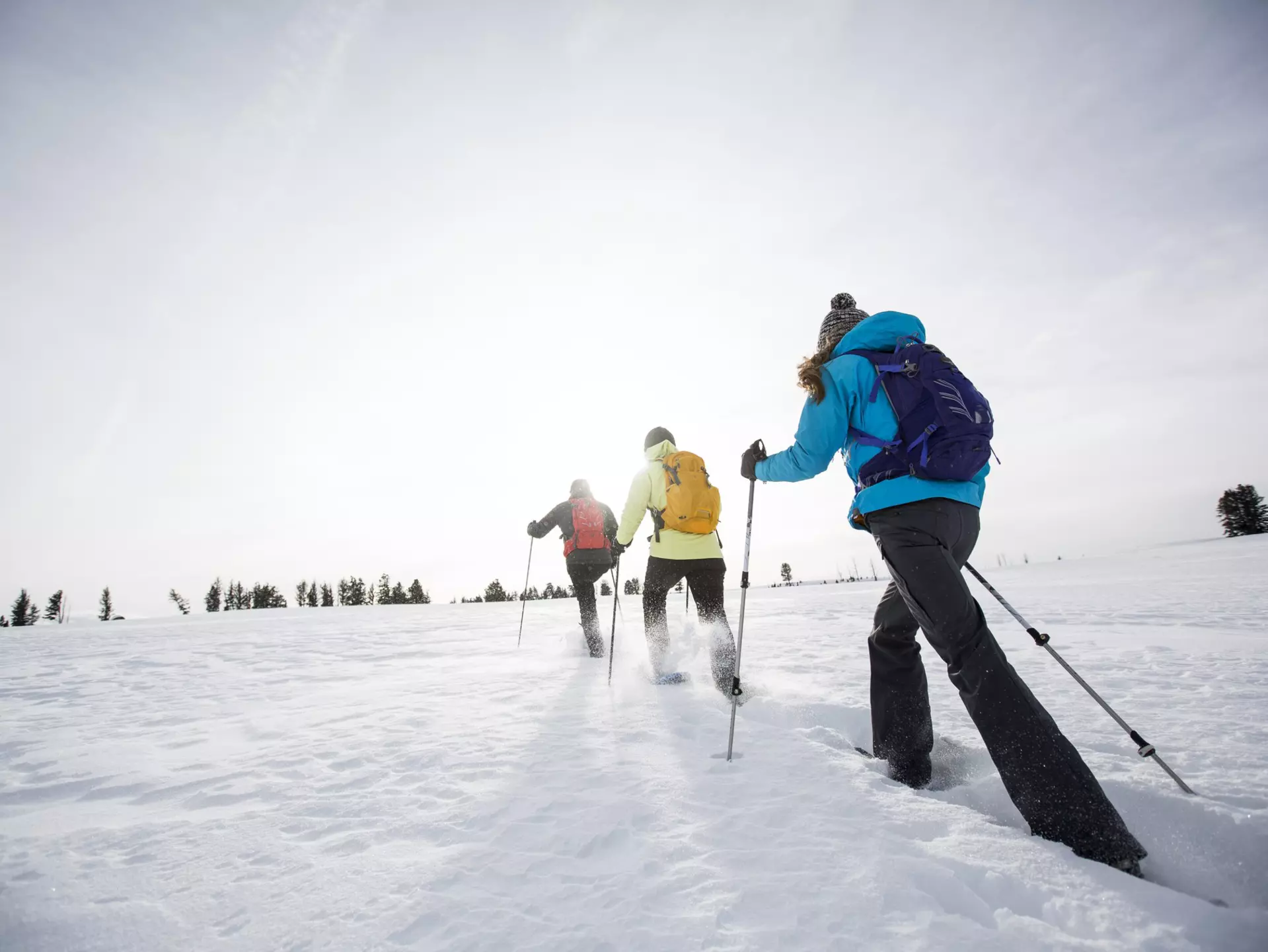Three people snow shoeing near Bozeman