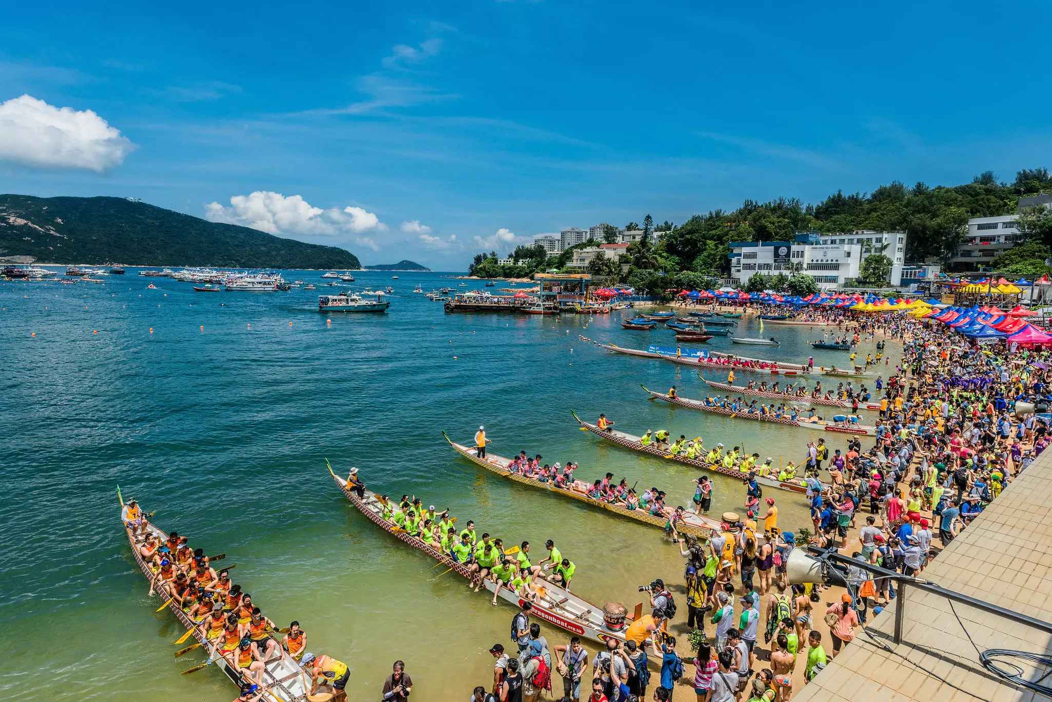 People racing in the dragon boat festival at Stanley, Hong Kong.