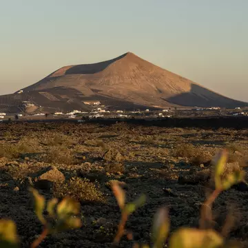sunset in the volcano landscape of Timanfaya in Lanzarote, License Type: media, Download Time: 2026-05-04T17:30:40.000Z, User: LP_NZhan, Editorial: false, purchase_order: 65050 - Digital Destinations and Articles, job: App Content, client: Lonely Planet, other: Nadine Zhan
