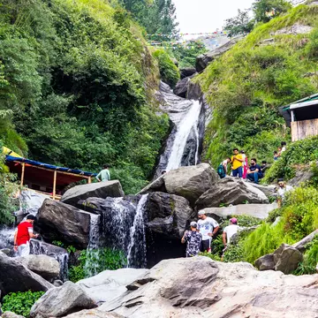  Majestic landscape of Bhagsu Nag waterfall and green nature around it. Mcleodganj, Himachal Pradesh, India.