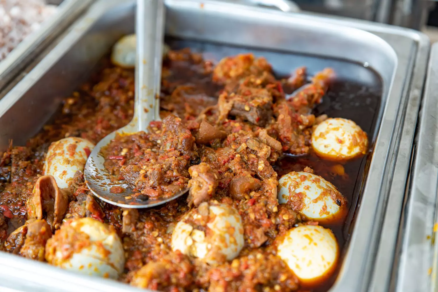 Ofada rice and stew is the signature dish of Abeokuta © Alucardion / Shutterstock