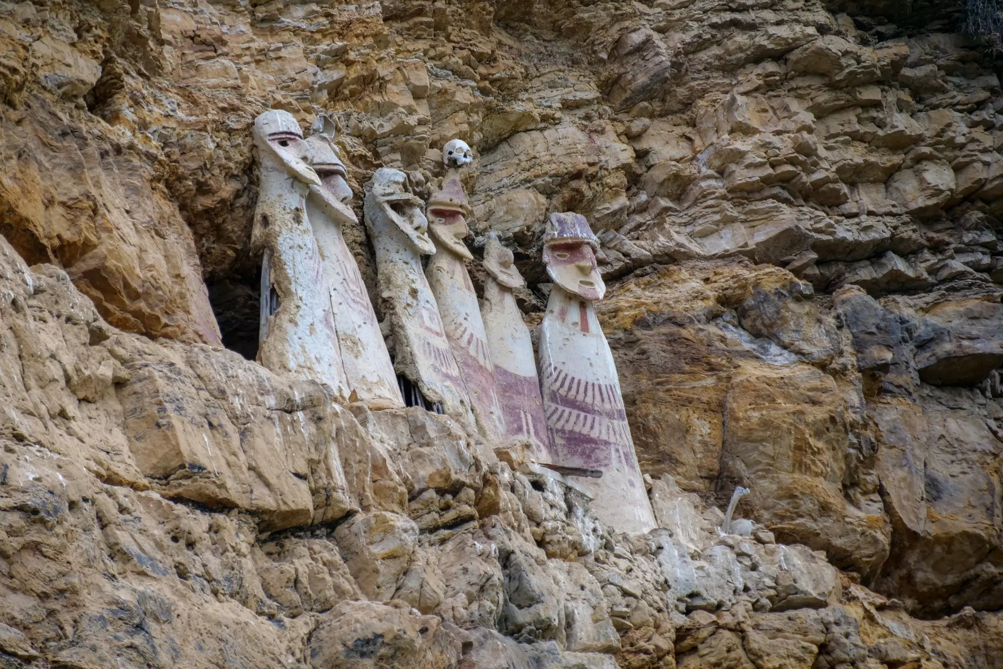 Chachapoyas, Peru - 08232023: The sarcophagi of Karajía, Chachapoyas, Peru. These clay tombs have human forms and are set along the edge of a rock cliff., License Type: media, Download Time: 2025-05-22T17:40:23.000Z, User: carolfarrell170, Editorial: true, purchase_order: 56530 - Guidebooks, job: Global Publishing WIP, client: Peru 12, other: carol farrell
