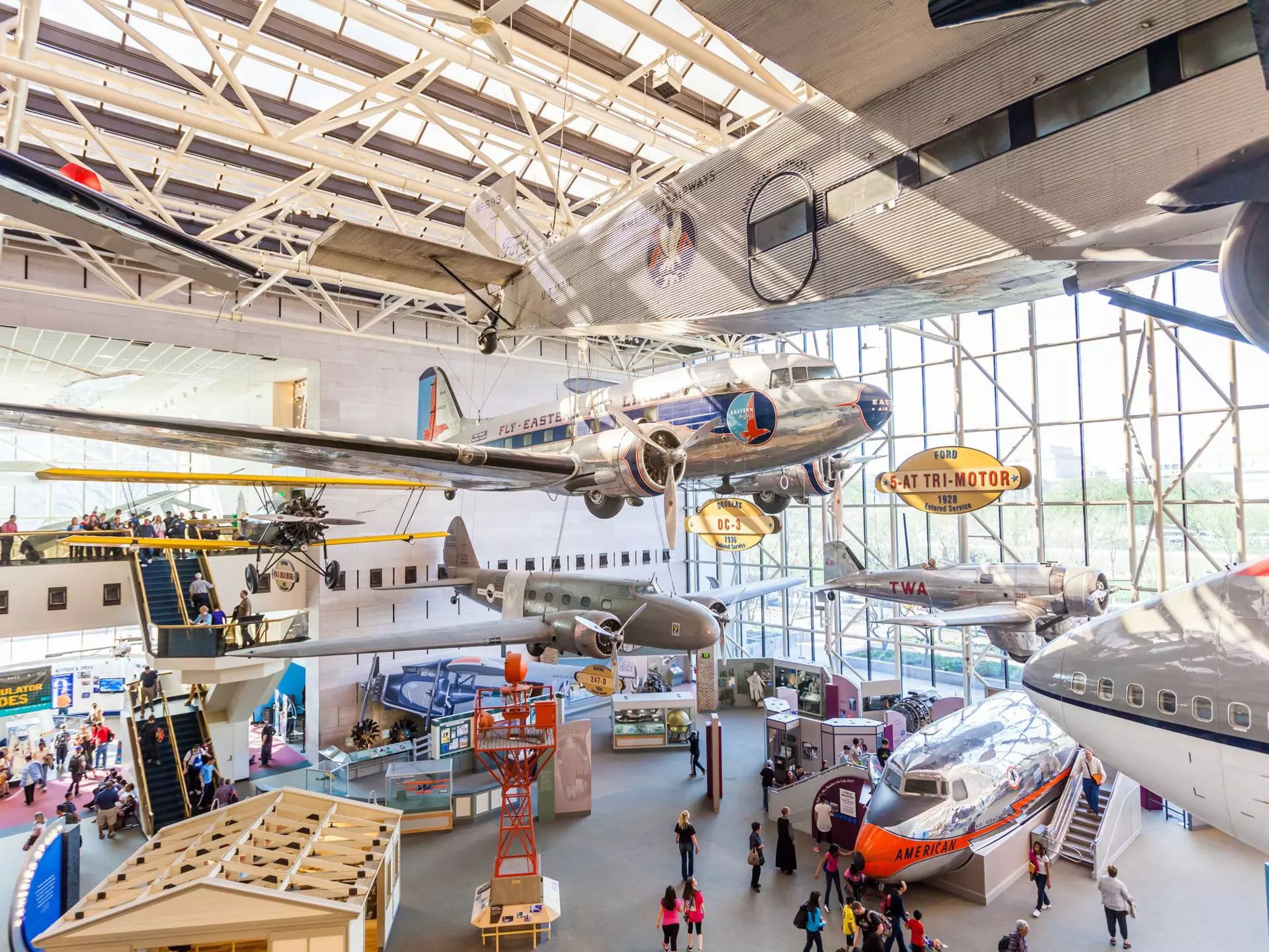 A large gallery of planes and other flying machines within a museum