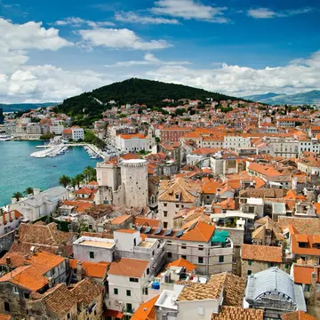 Aerial of Split's historic Diocletian's Palace, Old Town and Marjan hill.