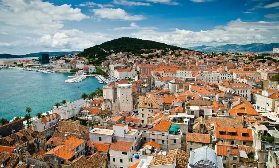Aerial of Split's historic Diocletian's Palace, Old Town and Marjan hill.