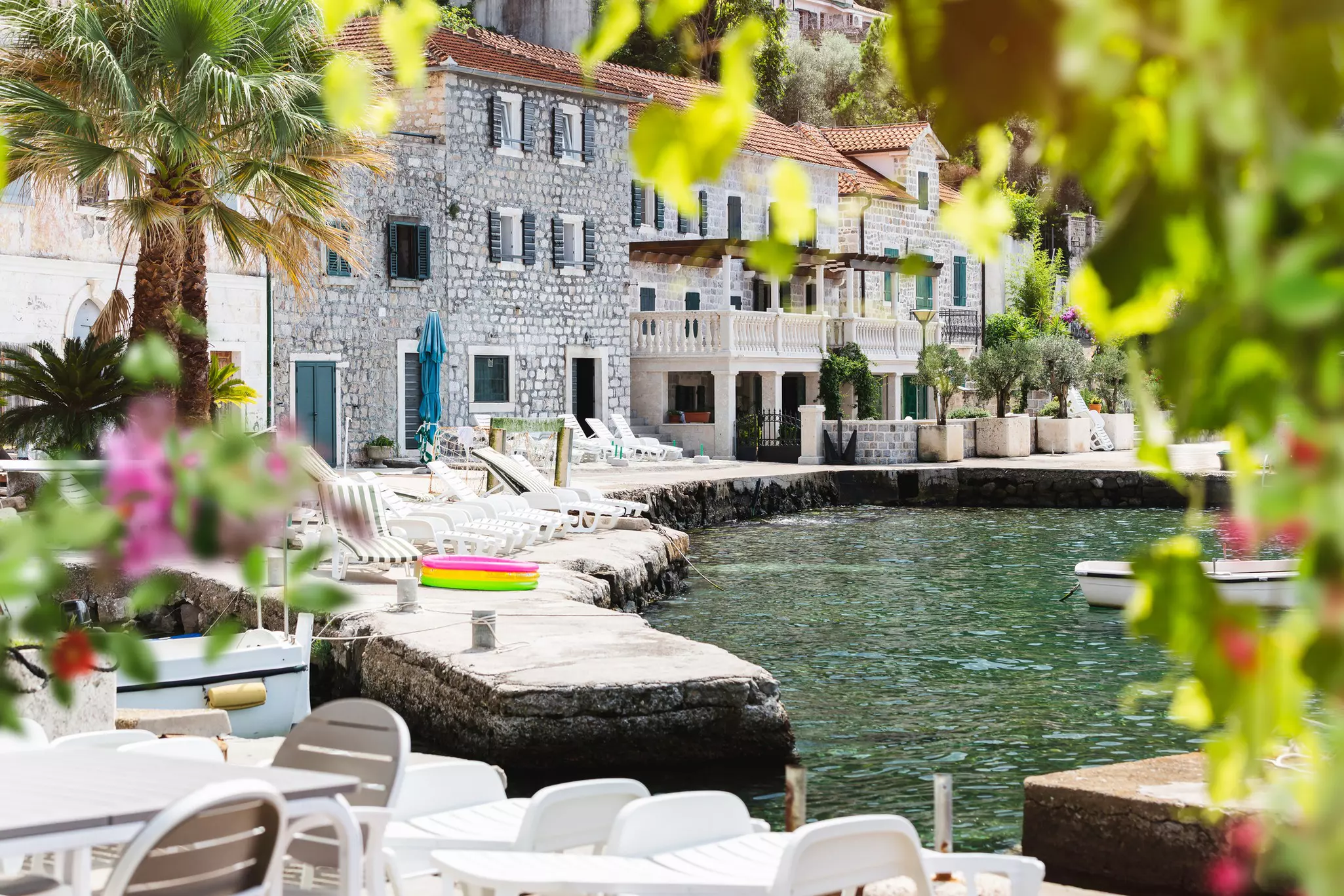 Stone houses on the waterfront in Rose on the Lustica Peninsula, Montenegro.