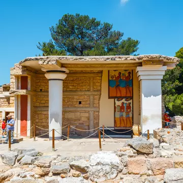 Visitors exploring the ancient Minoan Palace of Knossos near Heraklion, Crete, Greece