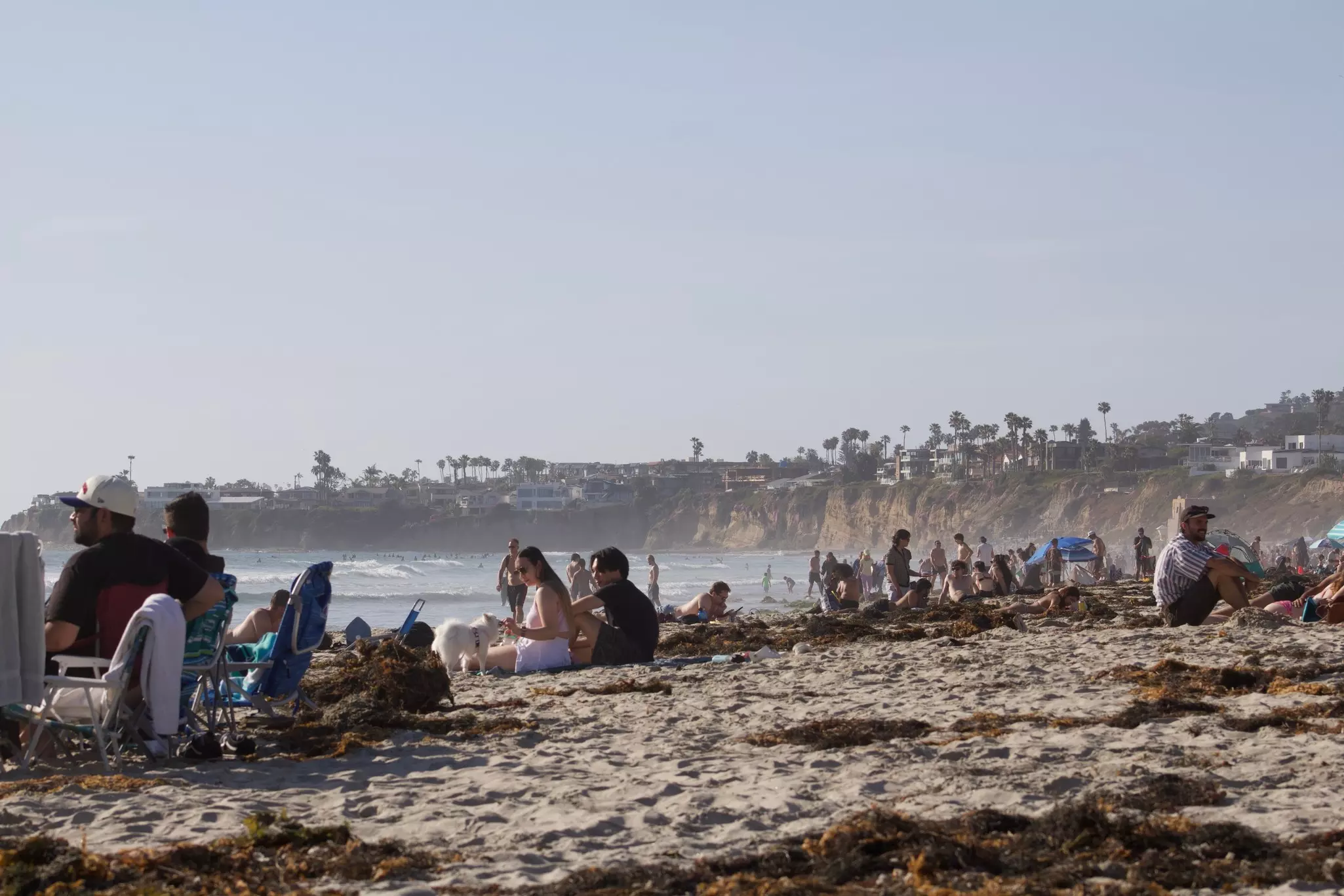 San Diego, California, United States. Beach goers tourists at the beach in pacific beach on sunny day, busy crowded beach