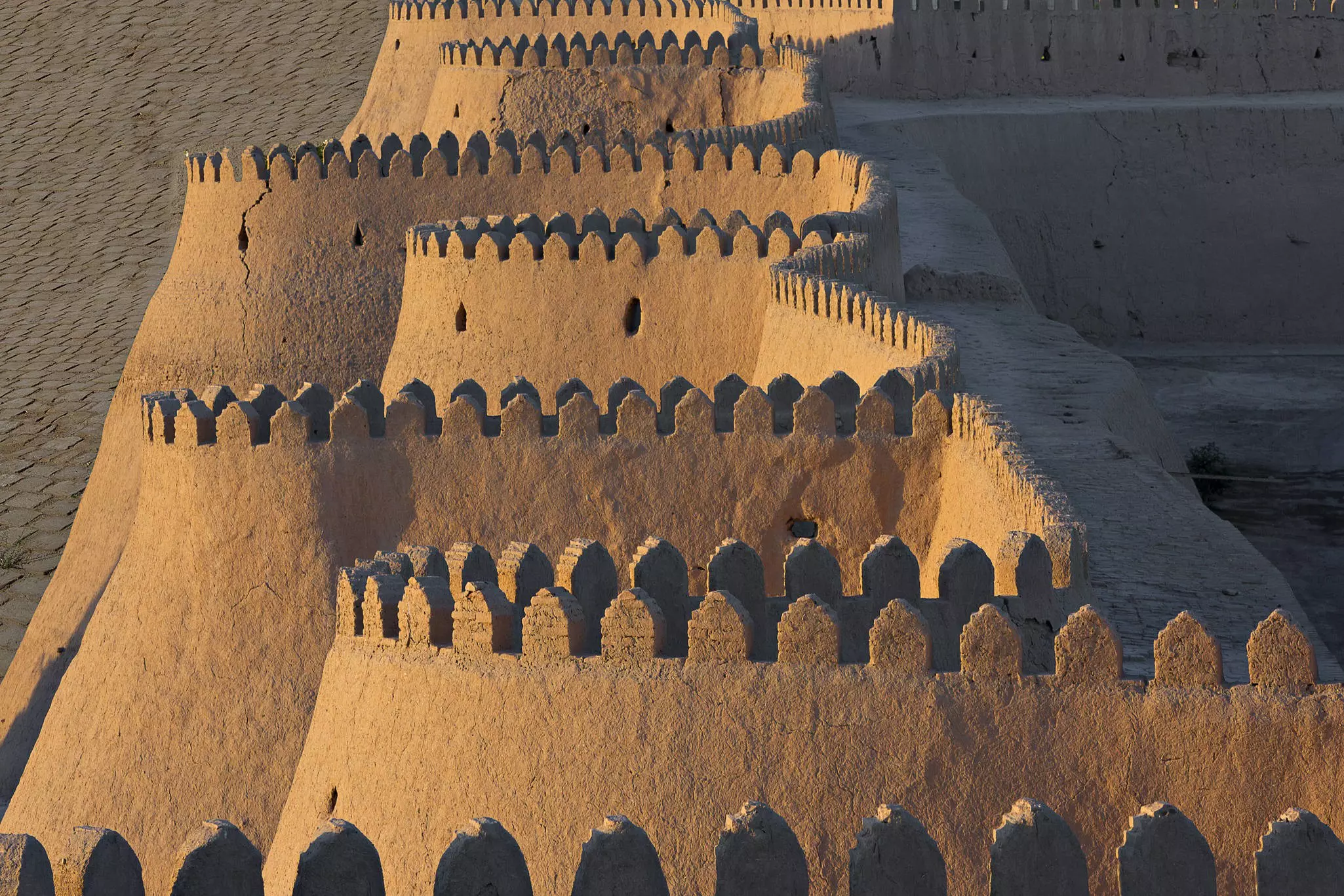 Sunlight on fortress walls in Khiva in Uzbekistan.