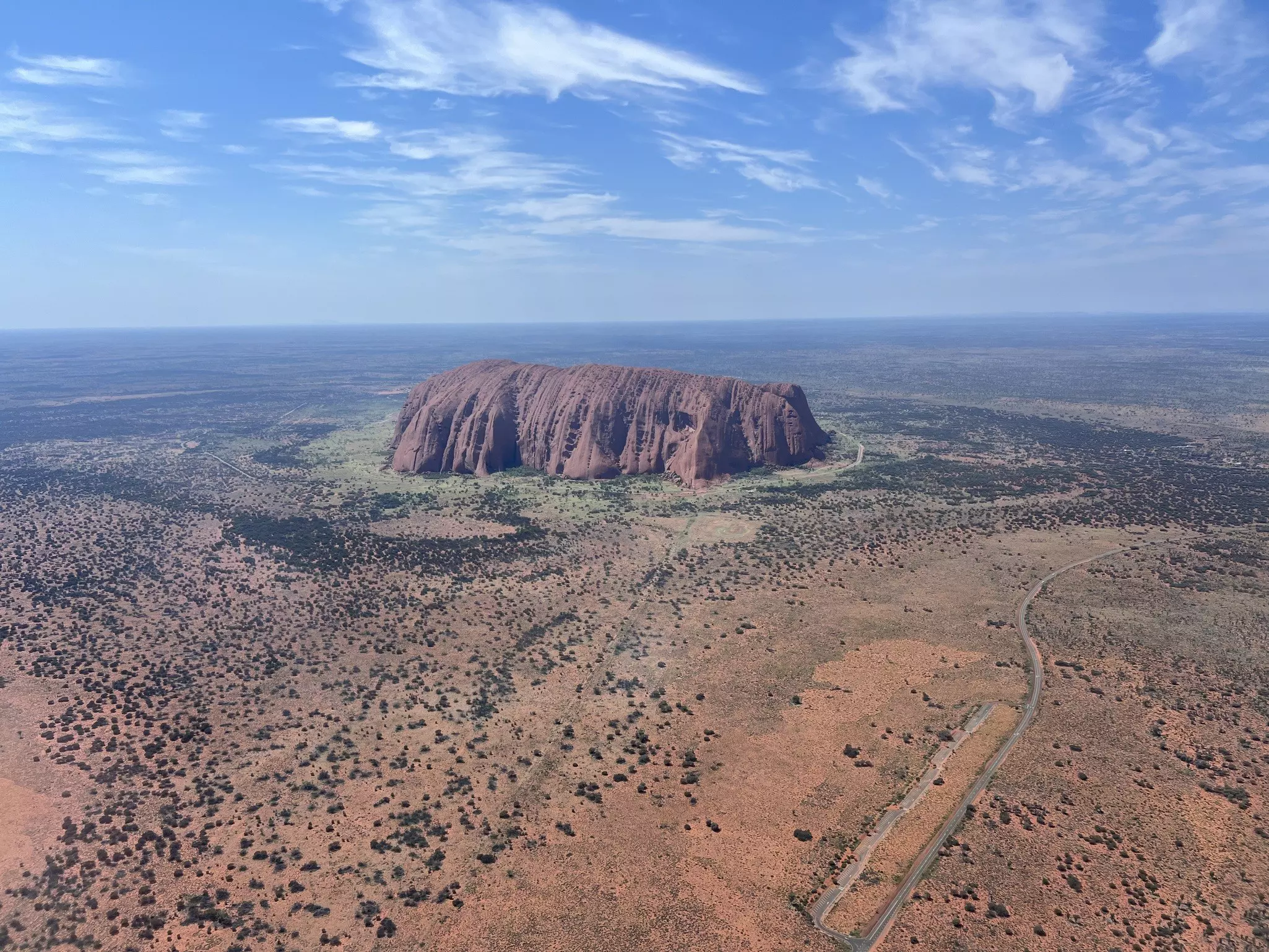 ULURU, NORTHERN TERRITORY, AUSTRALIA. OCTOBER 2024.
Uluru from the air.

This photo was approved in November 2024 by Uluru's media team as not violating guidelines.