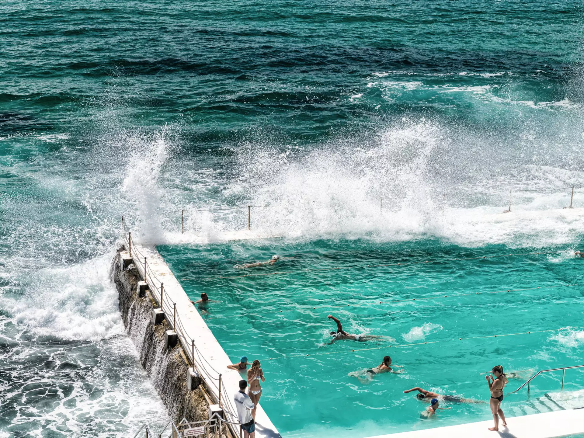 Beach Scene: Rock swimming pools on Pacific Ocean in Bondi, Sydney - Australia.
352508444
australia, beach, blue, bondi, coast, holiday, hot, icebergs, landscape, ocean, pacific, paradise, pool, popular, recreation, relaxation, sand, sea, seaside, summer, sun, sunshine, swimming, sydney, tourism, tourist, travel, turquoise, vacation, water, waves