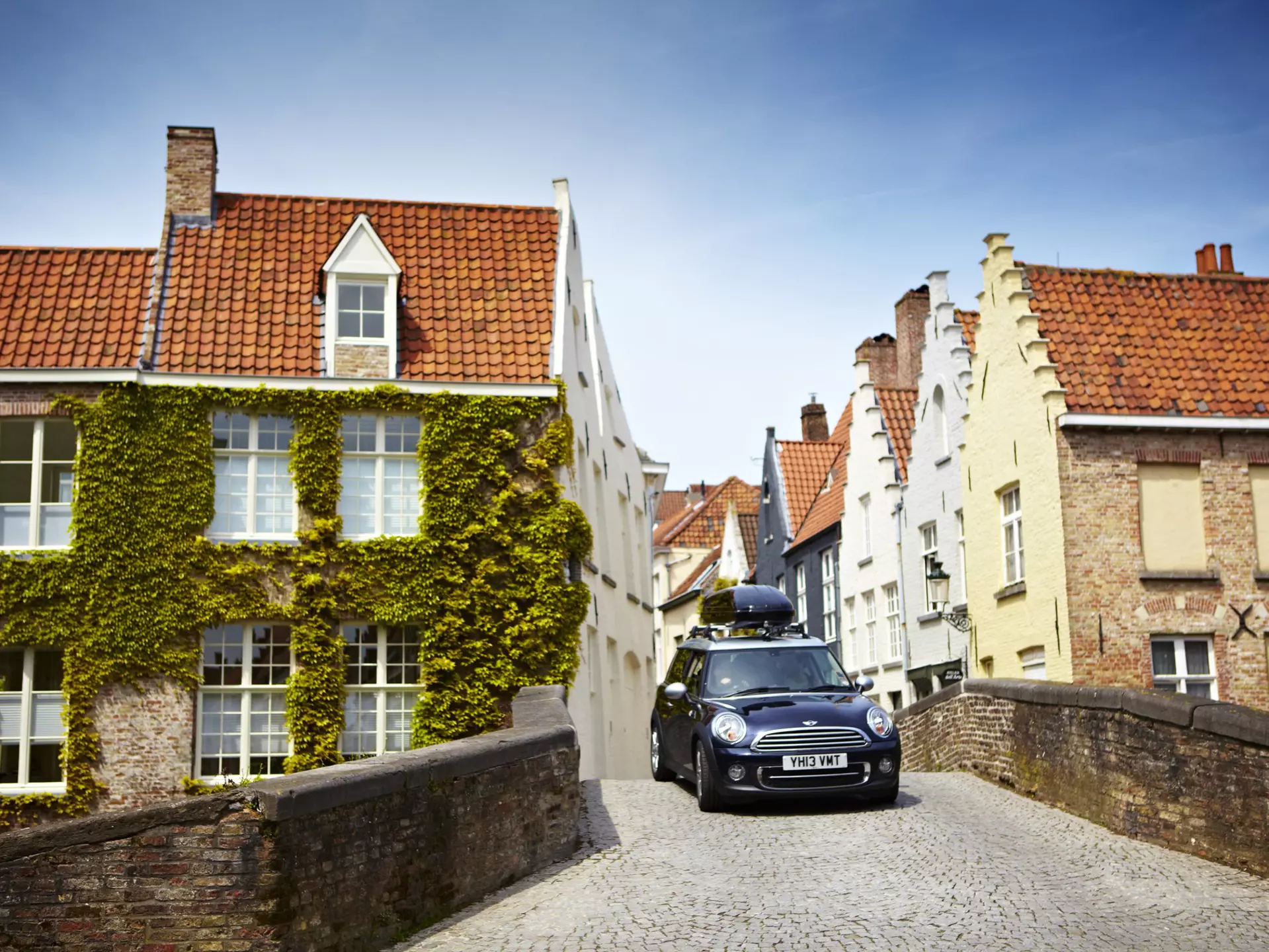Mini driving on narrow cobbled street.
Issue 57, acrosstheplanet, Lonely Planet Traveller Magazine