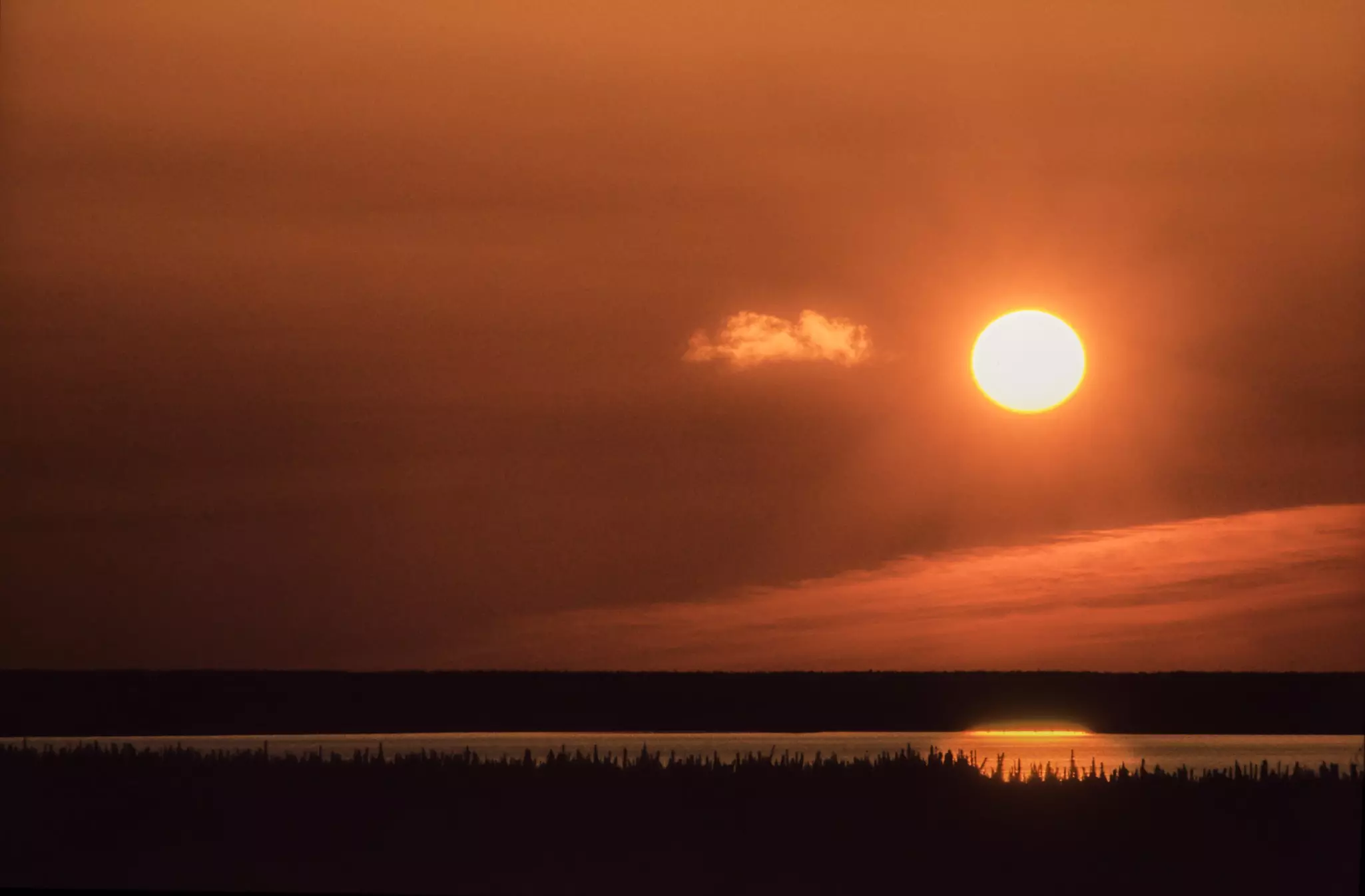 The midnight sun shines bright every summer in the Northwest Territories © Pierre Longnus / Getty Images