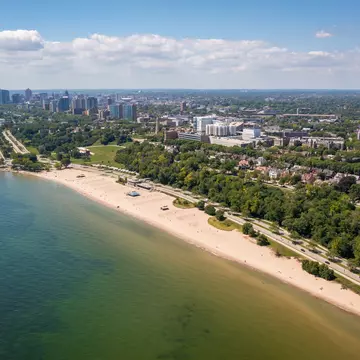 Aerial view Lake Michigan coastline featuring Lake Park, Bradford Beach and downtown Milwaukee skyline.  License Type: media  Download Time: 2021-10-06T09:18:16.000Z  User: clairenaylor  Is Editorial: No  purchase_order:   