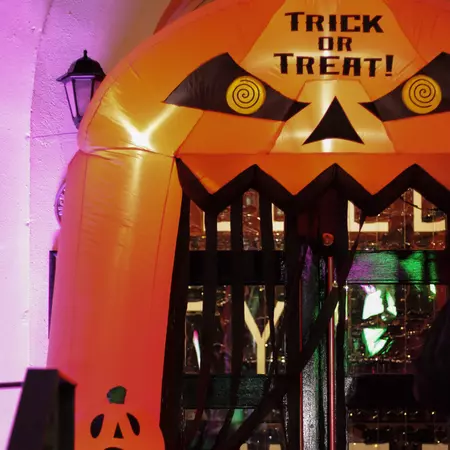 An orange archway reads "Trick or Treat."