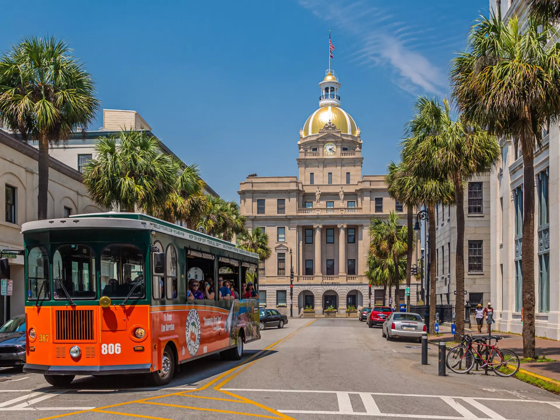 A trolley tour bus rolls through downtown Savannah, Georgia. Darryl Brooks/Shutterstock