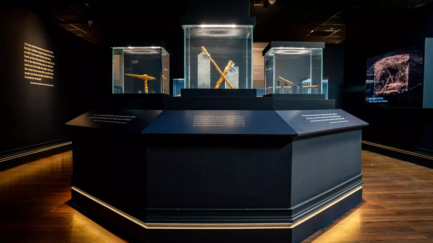 At the new exhibition, fragments of the slave ship Clotilda are displayed in water tanks © History Museum of Mobile