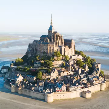 Le Mont Saint-Michel tidal island in beautiful twilight at dusk, Normandy, France