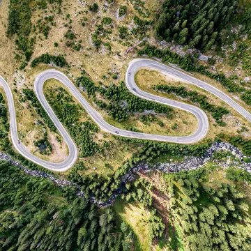 Aerial of the windy Transfagarasan highway.
1171011124
Spiral, Nature, Environment, transfagaras, Avenue, Sunset, Road, Avatar, Transfagara?an, Lumber Industry, transfagarashan, Romania, Woodland, Ecosystem, Car, Bird, Bird's Eye, Transalpina, Roadside, Sky, Italy, Outdoors, transfagarash, Highway, Sunlight, Tianmen, Transylvania, No People, Mountain, Road Trip, Adventure, Sequoia Tree, Animal Body Part, Giant, Travel, Horizontal, Forest, Europe, Photography, Animal Eye, Eye