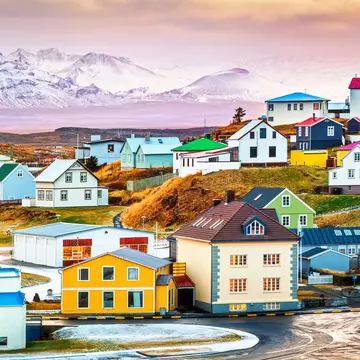 Panorama of colourful houses in Stykkisholmur, with snow-capped mountains beyond.
784268242
outdoor, cold, island, coast, destination, town, houses, natural, travel, view, typical, day, peaks, iceland, dramatic, mountains, panoramic, scenery, light, old, village, afternoon, icelandic, homes, architecture, city, winter, colorful, panorama, terrain, buildings, sky, scenic, tourism, scene, beautiful, snow, rugged, nature, residential, europe, nordic, landscape, cityscape, stykkisholmur, snowcapped, snaefellsnes