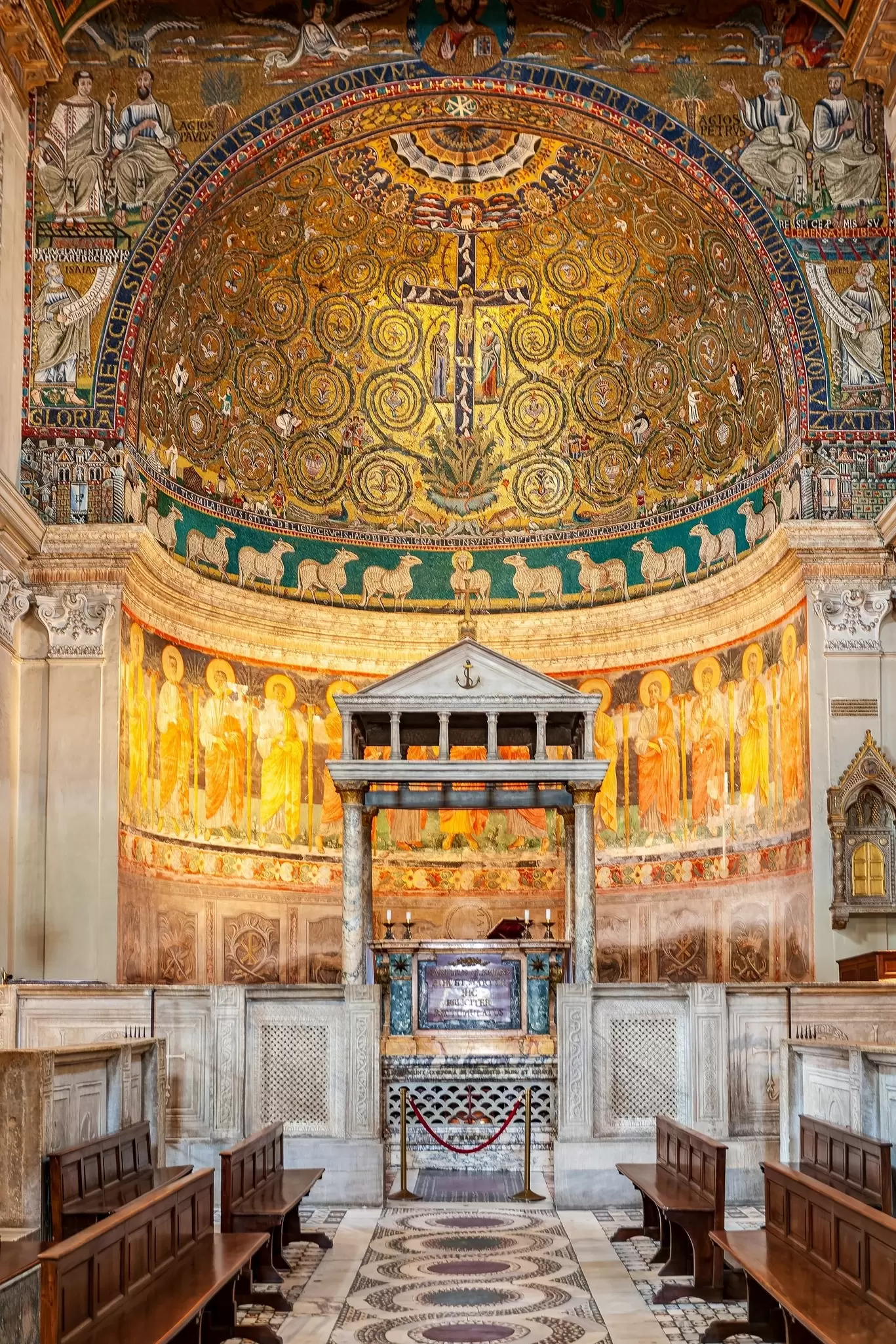 The apse of the Basilica di San Clemente in Rome, Italy, with mosaics depicting the 'Trionfo della Croce'.