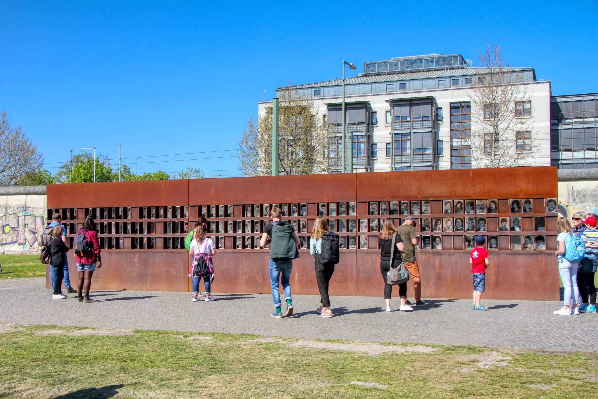 The GedenkstÃ¤tte Berliner Mauer (Berlin Wall Memorial) commemorates the division of Berlin by the Berlin Wall and the deaths that occurred there.