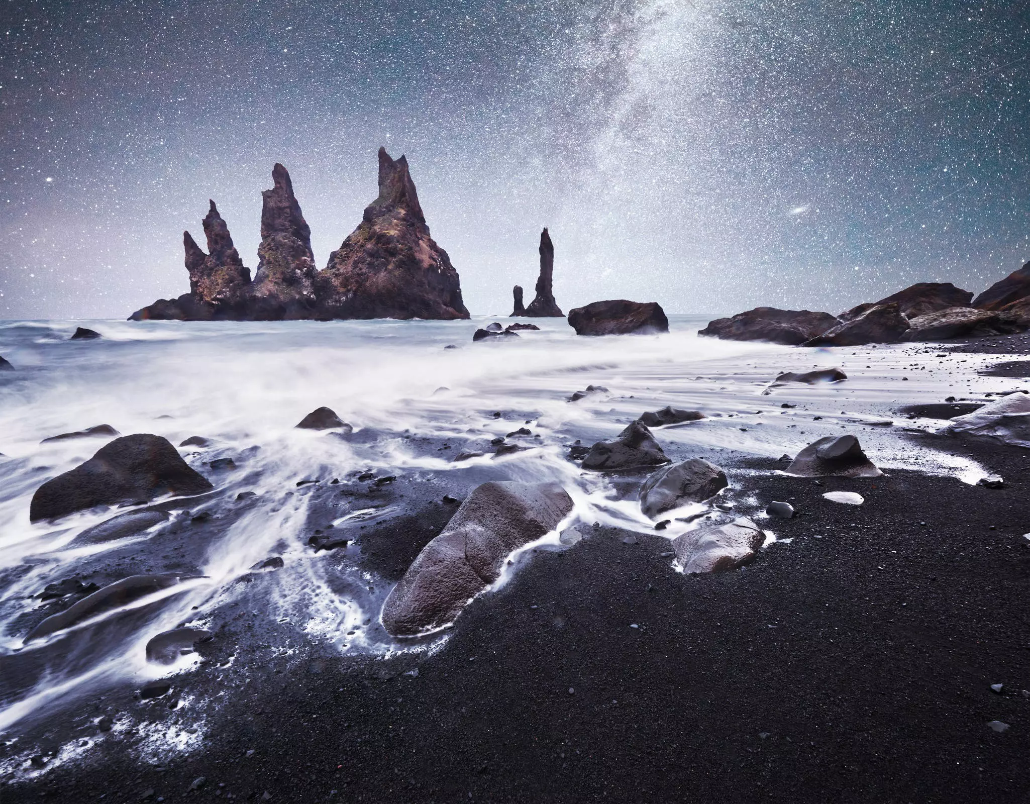 Icebergs floating in Jokulsarlon glacial lake. South Iceland. Lagoon. Starry sky night. Fantastic milky way.