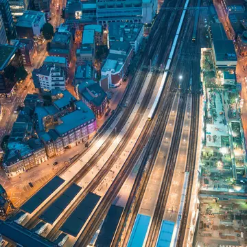 London. Train station and Tower Bridge night lights, aerial view.
213540391
tracks, network, tower, street, aerial, many, river, view, london, urban, landmark, rail, building, train, dark, transport, place, famous, architecture, city, above, railway, outdoors, transportation, thames, tourism, station, bridge, image, europe, exterior, multiple, landscape