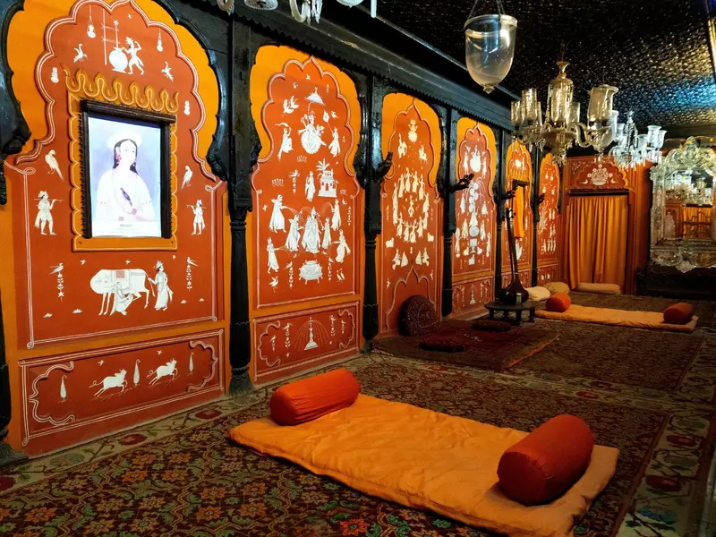 Inlaid panels are on display in a museum gallery.