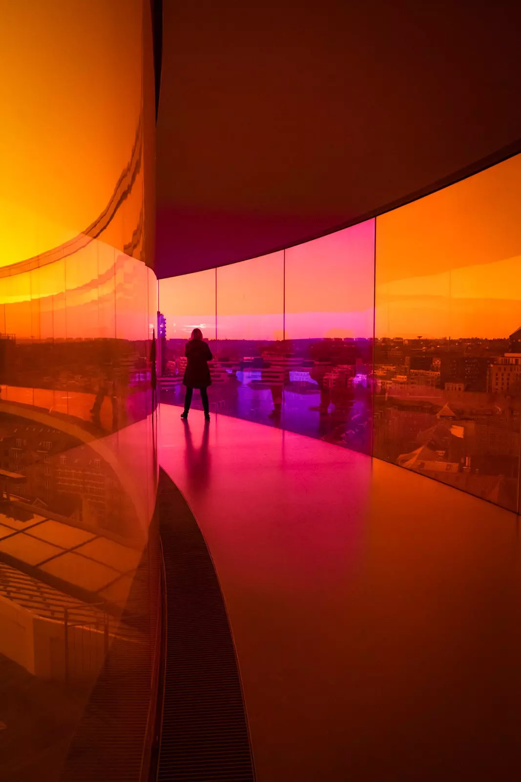 Woman admires the views of Aarhus from the roof of ARos. A Lonely Planet writer took this image.
