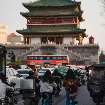 People cycling on the street in Xi'an, China.