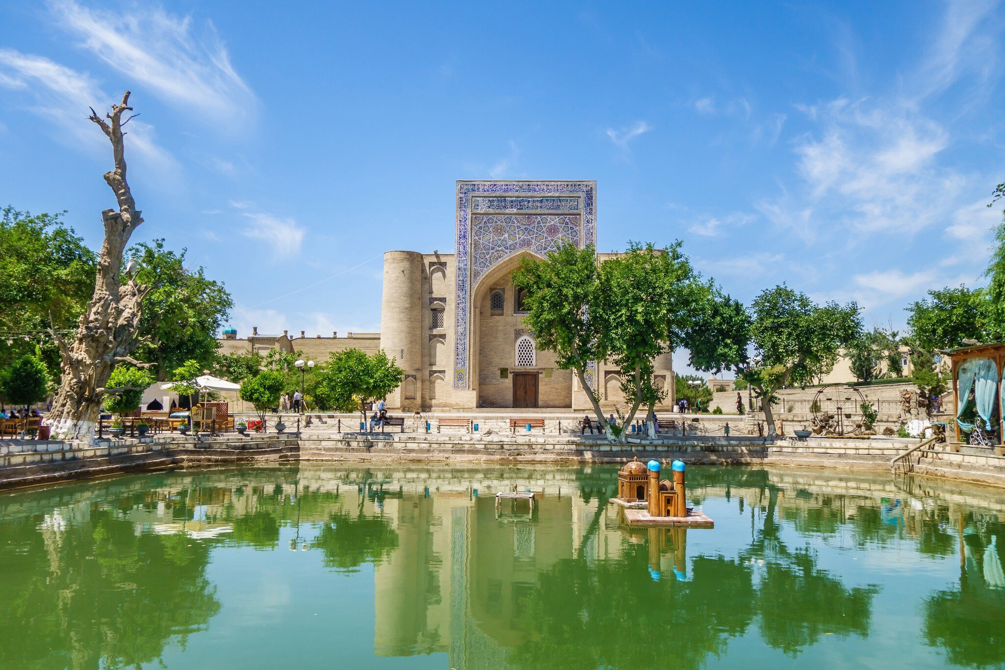 Panorama of Lyab-i Hauz, an architectural ensemble of buildings 16-17 centuries in the center of Bukhara, Uzbekistan. In the background you can see the building of the khanqah of Divan-begi; Shutterstock ID 2128072724;