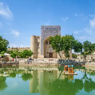 Panorama of Lyab-i Hauz, an architectural ensemble of buildings 16-17 centuries in the center of Bukhara, Uzbekistan. In the background you can see the building of the khanqah of Divan-begi; Shutterstock ID 2128072724;