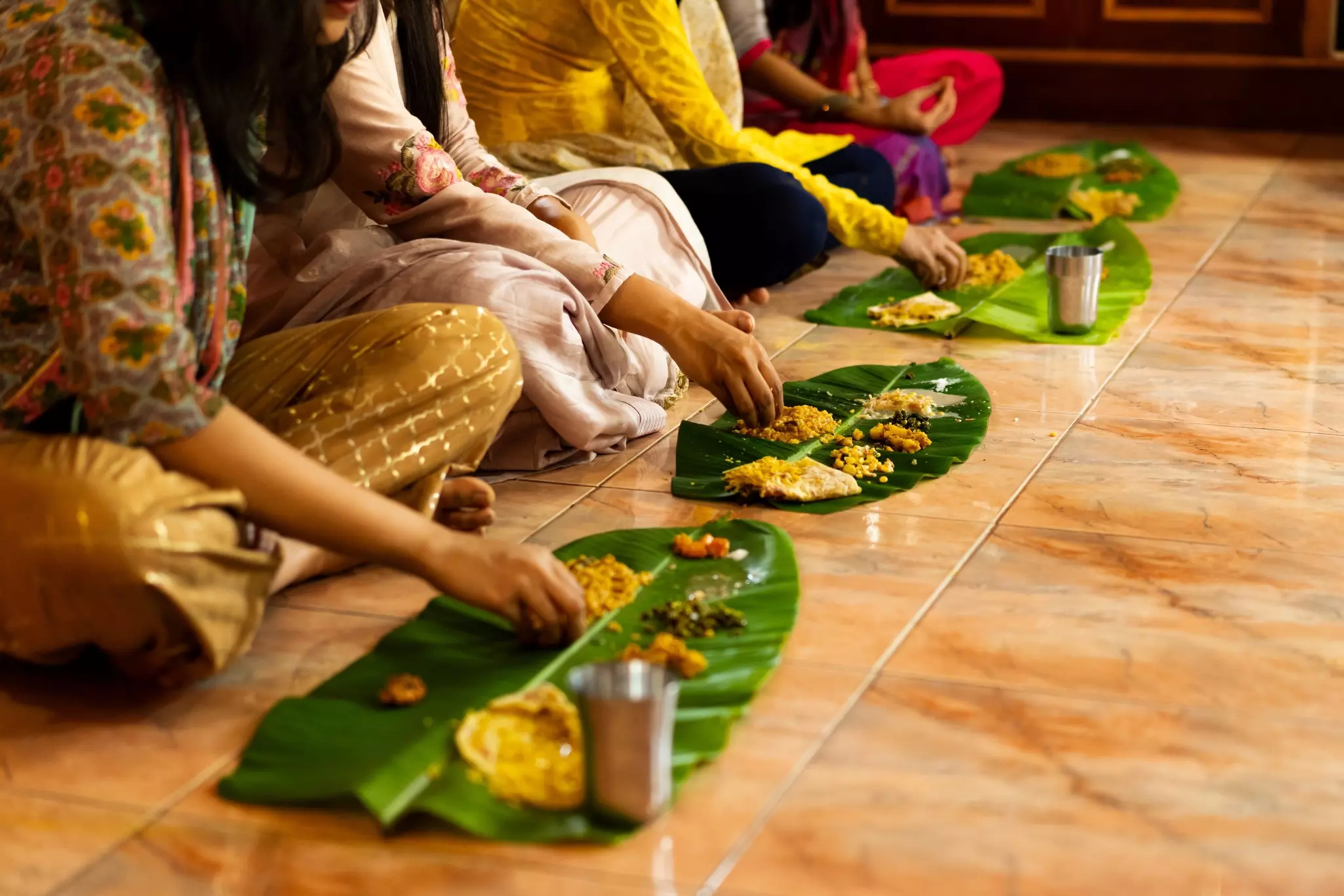 Traditional South Indian food served on a banana leaf and eaten by hand.