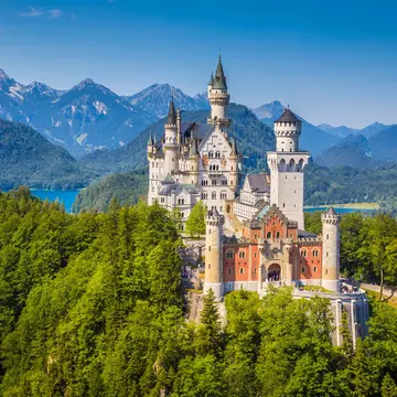 A road trip through the Bavarian Alps will take you to castles, lakes and mountain viewpoints. bluejayphoto/Getty Images