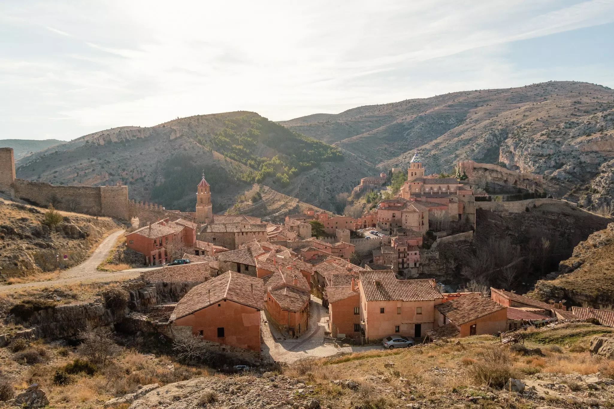 Red sandstone terracotta medieval houses on an arid hilltop village