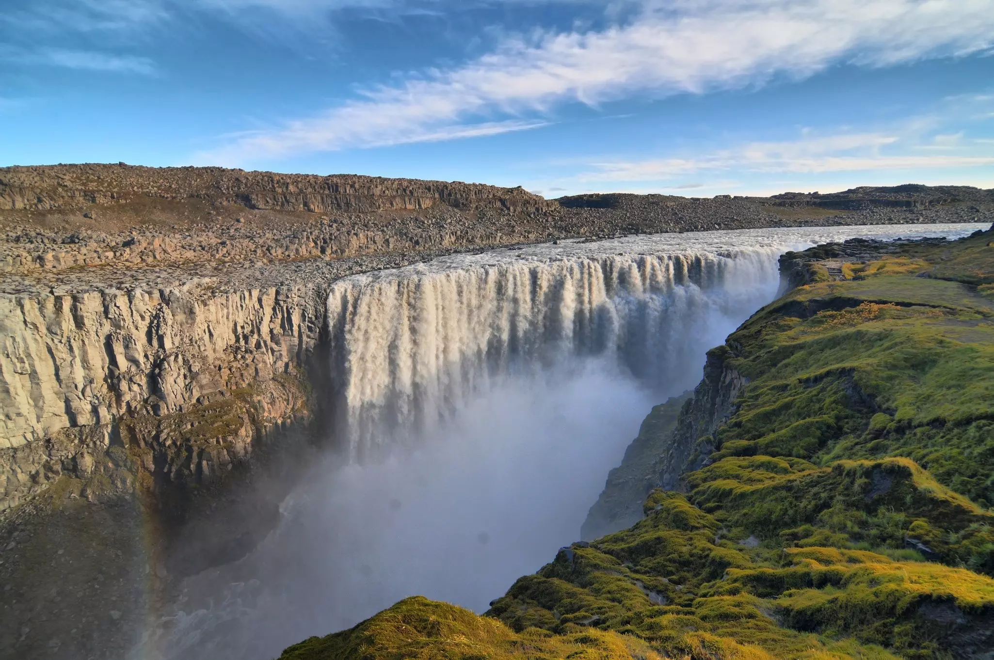The waterfall of Dettifoss surges into a rocky gorge in Iceland.