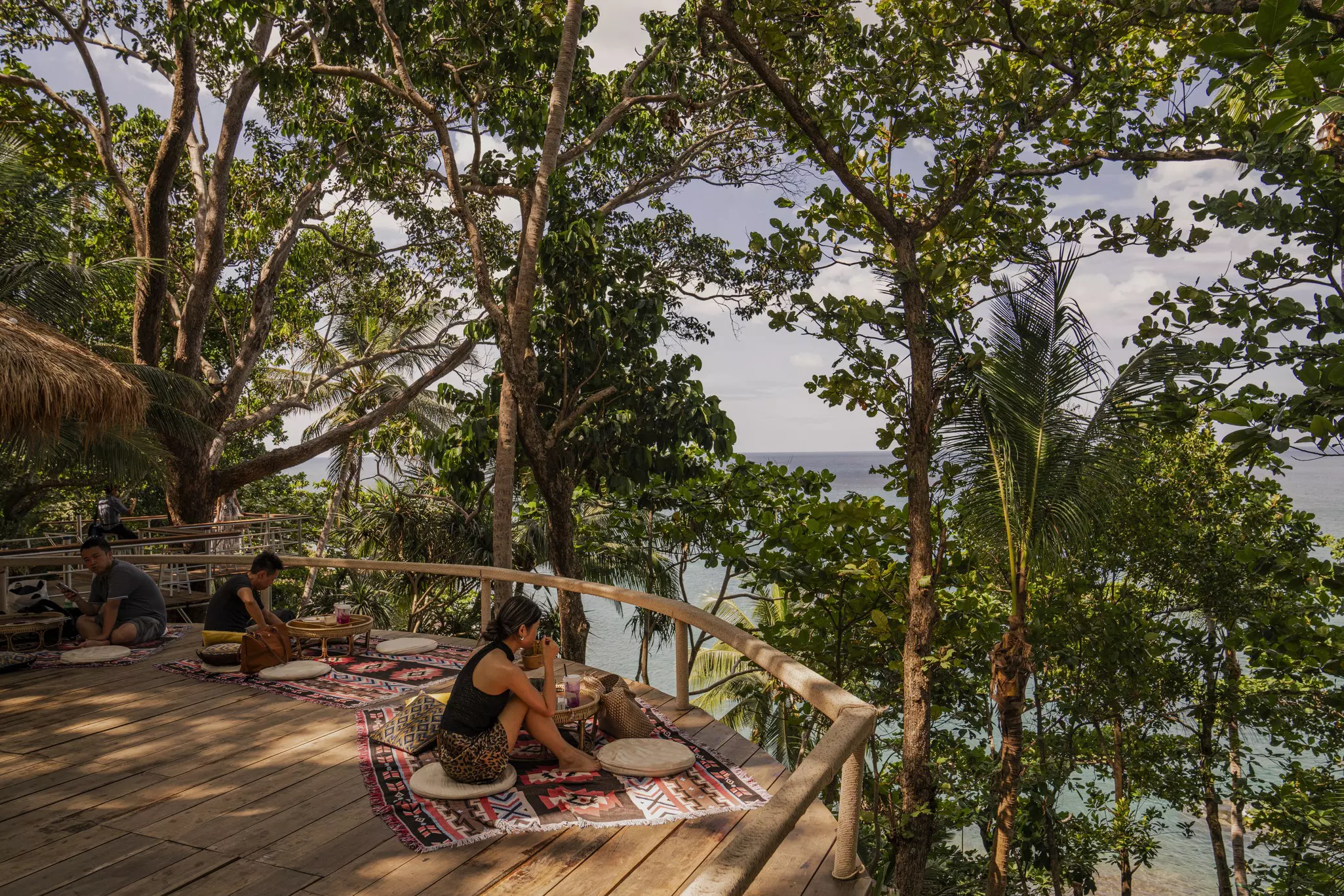 Enjoying lunch in a treehouse cafe in Phuket, Thailand