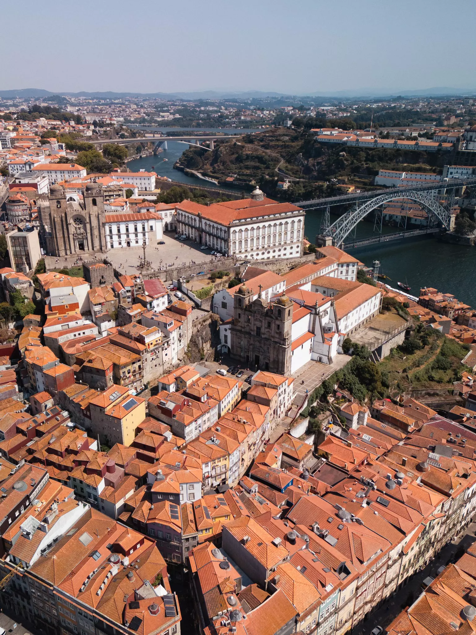 The Dom Luis I Bridge amidst the orange roofs of Porto