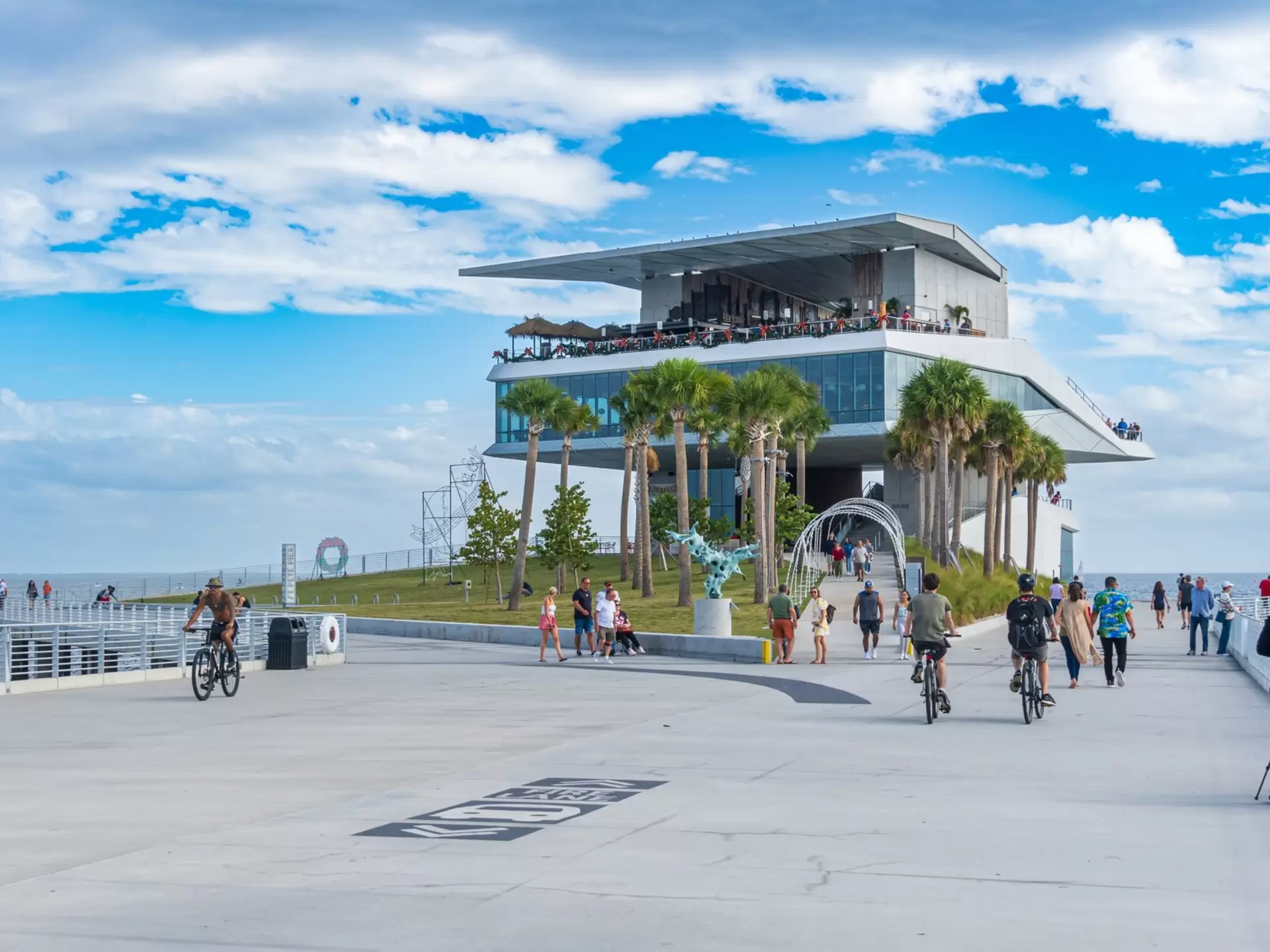 People enjoying the pier at St Petersburg, Florida. Sunshower Shots/Shutterstock