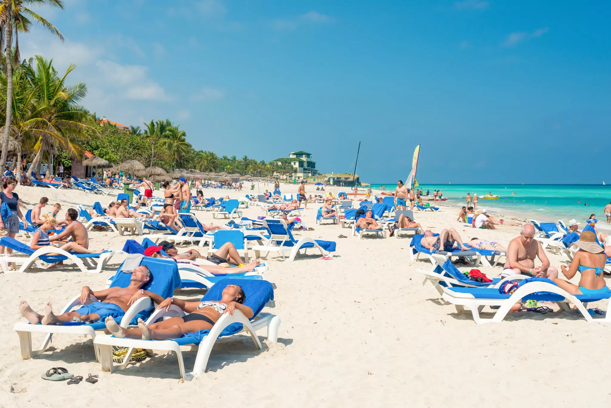 VARADERO,CUBA - APRIL 28,2014 : Tourists sunbathing and relaxing on a beautiful sunny day at the beach, License Type: media, Download Time: 2025-11-27T19:39:45.000Z, User: bhealy950, Editorial: true, purchase_order: 65050 - Digital Destinations and Articles, job: Lonely Planet Online Editorial, client: Accommodations in Cuba, other: Brian Healy