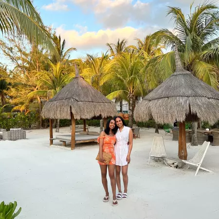 Serina and her sister enjoy a beach bar. Serina Patel/Lonely Planet